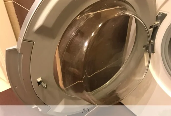 Дверца стиральной машины перед очисткой
