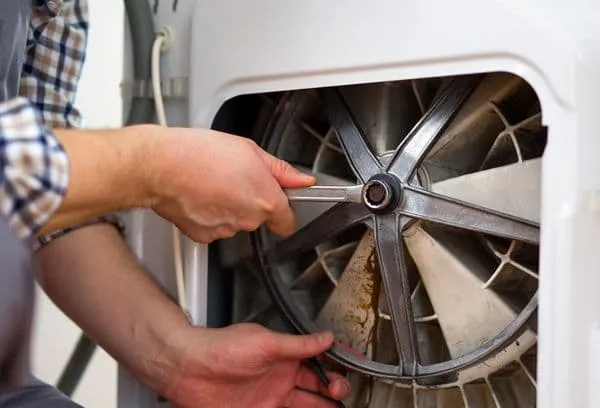 Смазка и ремонт стиральных машин: от амортизаторов до подшипников