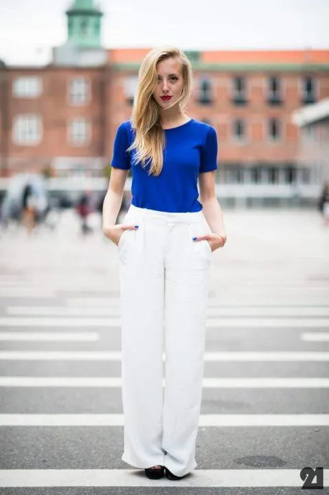 Белые брюки: стильные модели и модные образы. Что одеть с белыми брюками женщине фото 21