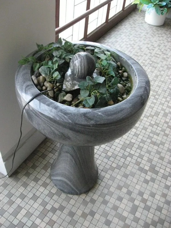 Цветочный горшок из натурального камня с фонтаном