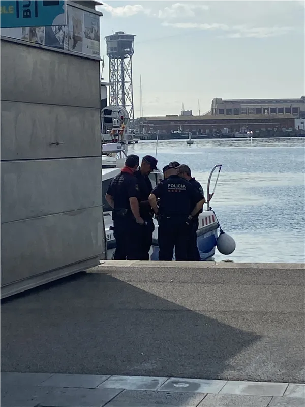 Police were seen preparing to board a boat - but appeared to have no divers