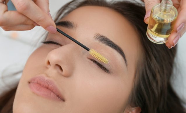 young-woman-undergoing-eyelash-treatment-procedure