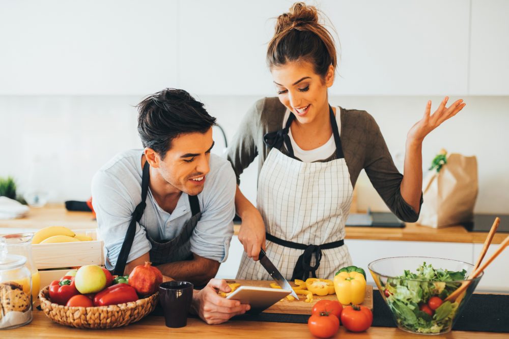 young-couple-cooking-in-the-kitchen