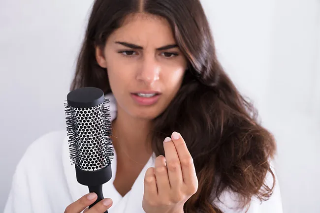 Основные причины выпадения волос. Почему волосы выпадают у женщин 10